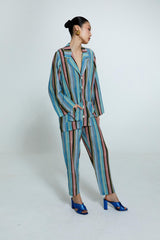 Calça feminina listrada multicolorida, em seda 100%, com modelagem reta e cós elástico