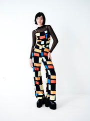 Top estampado em 100% viscose com recortes geométricos e ajuste elástico posterior